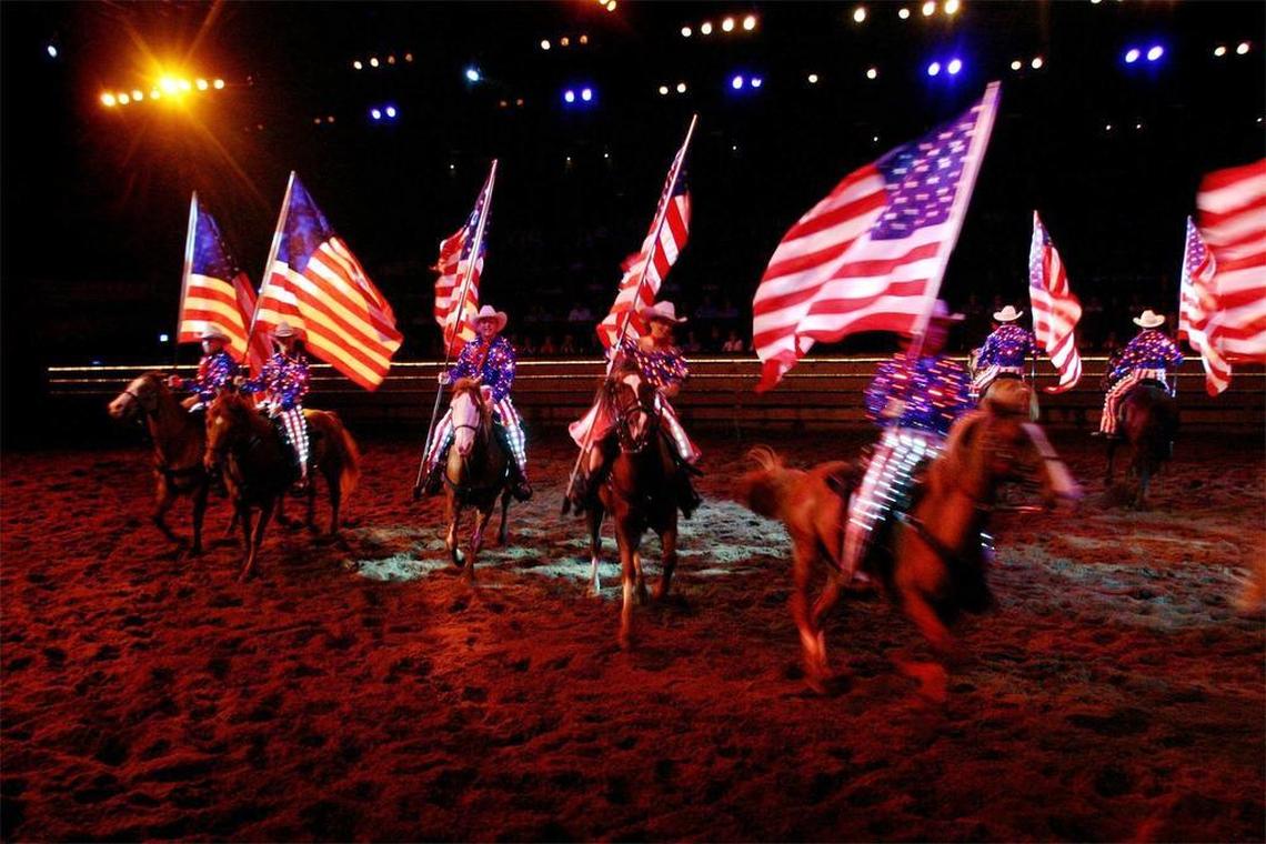 Dixie Stampede closes each show with a patriotic flourish, a staple of shows in Branson, Missouri.