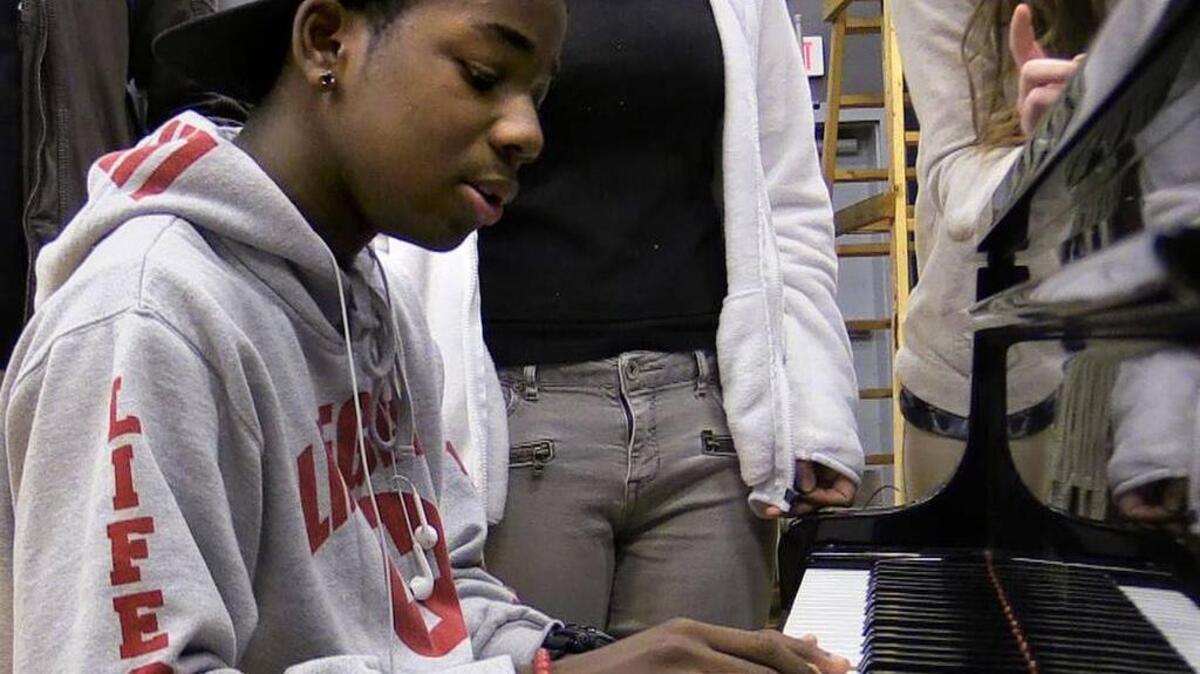 Bluffton High School student and American Idol contestant Lee Jean plays the piano during theater class on Monday morning at the school. Lee may appear this week on American Idol's "Hollywood Week."