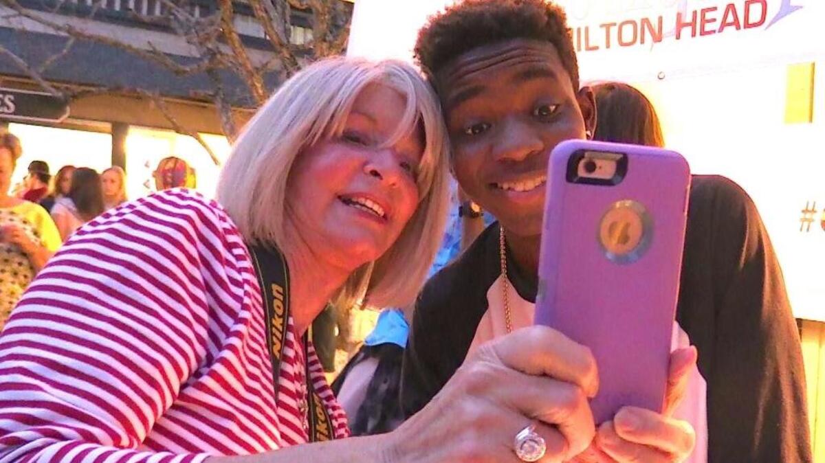 Beth McKay of Hilton Head was one of hundreds at Coligny Plaza on Saturday night to hear Jean, fresh off a Top 8 finish on “American Idol,” perform along with the local band Native. In addition to taking pictures with fans, Jean, 16, a junior at Bluffton High School, kept busy signing autographs for a line of admirers.
