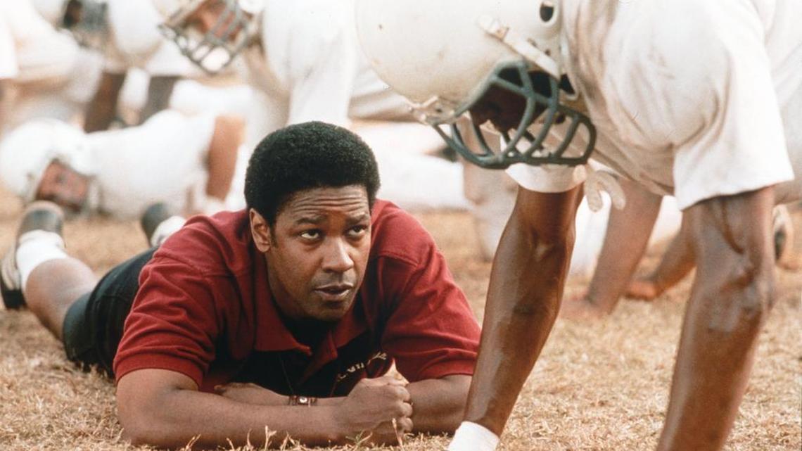 Denzel Washington stars as coach Herman Boone in ‘Remember the Titans,’ a favorite movie of sports fans.