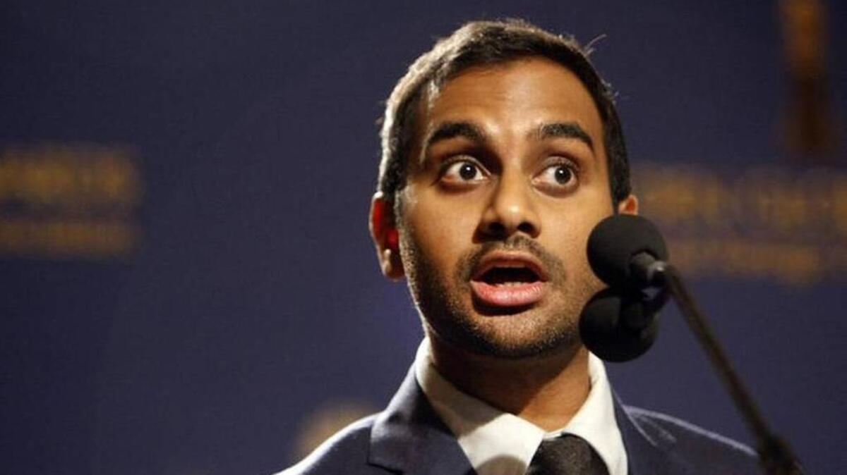 Aziz Ansari announces nominations for the Golden Globe Awards on Dec. 12, 2013, in Los Angeles.