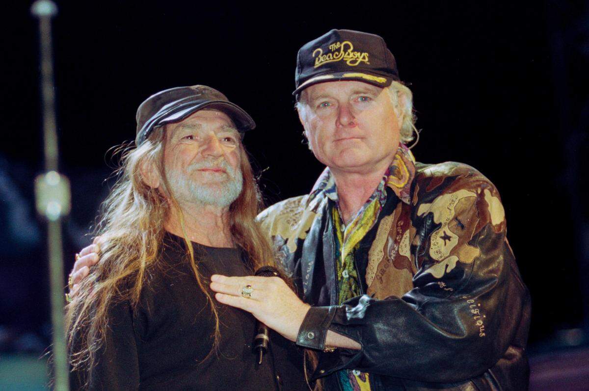 Willie Nelson and Mike Love of the Beach Boys during the Farm Aid concert at Williams-Brice Stadium on Oct. 12, 1996. 