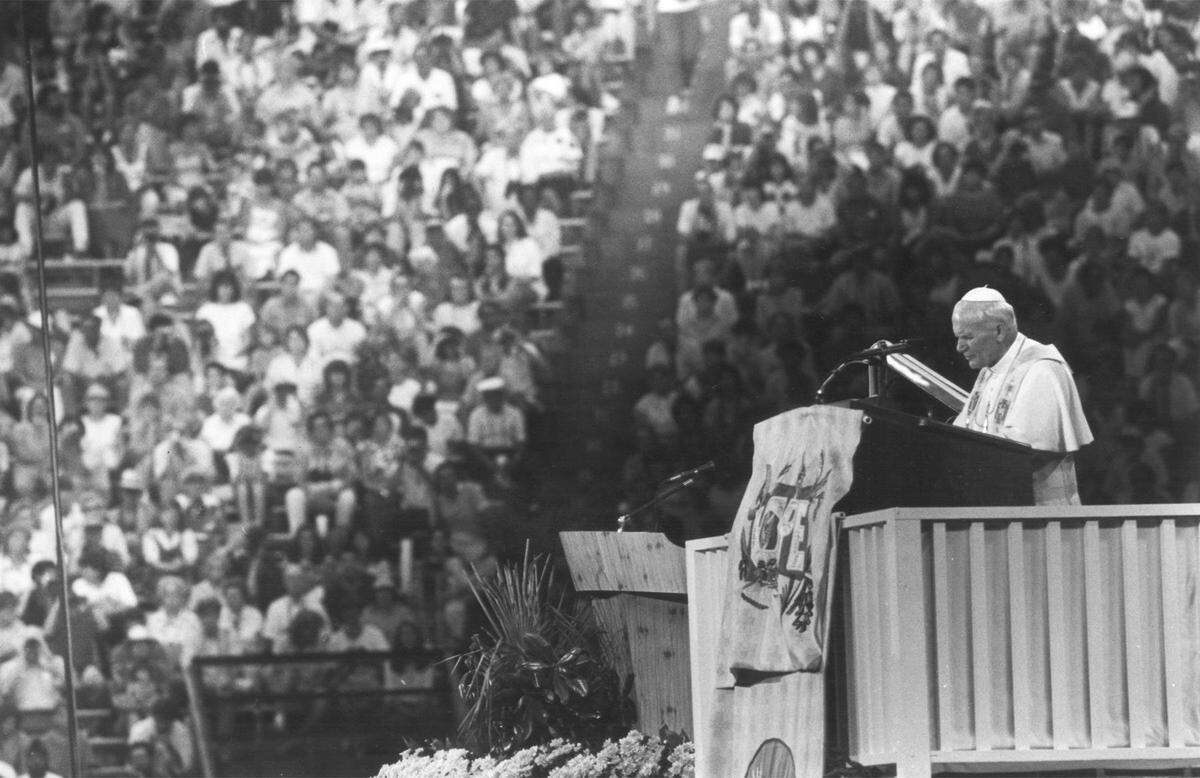 Pope John Paul speaks to a crowd at the William BrIce stadium in 1987.