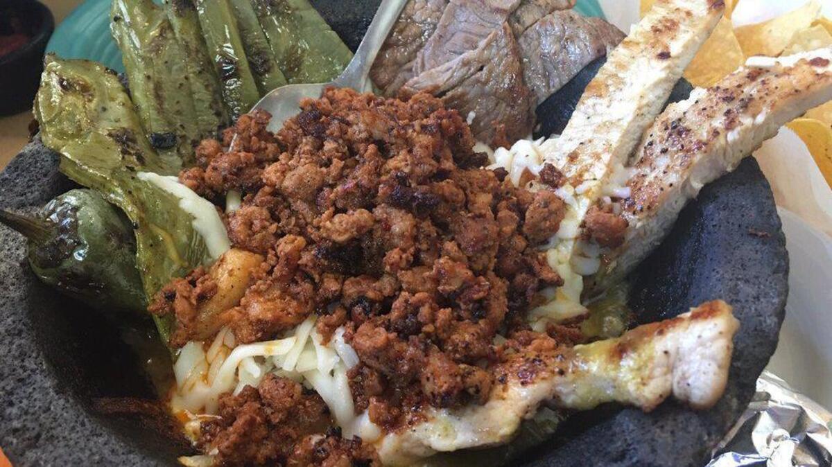 Eat a bowlful of bold flavors in an equally bold way with the mojalcete at Real Mexico on Bush River Road.