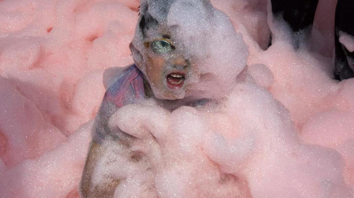 The Bubble Run is the finale of a summer series of running events at Saluda Shoals Park. Colored foam, like the stuff shown here, will be churned out along the course.