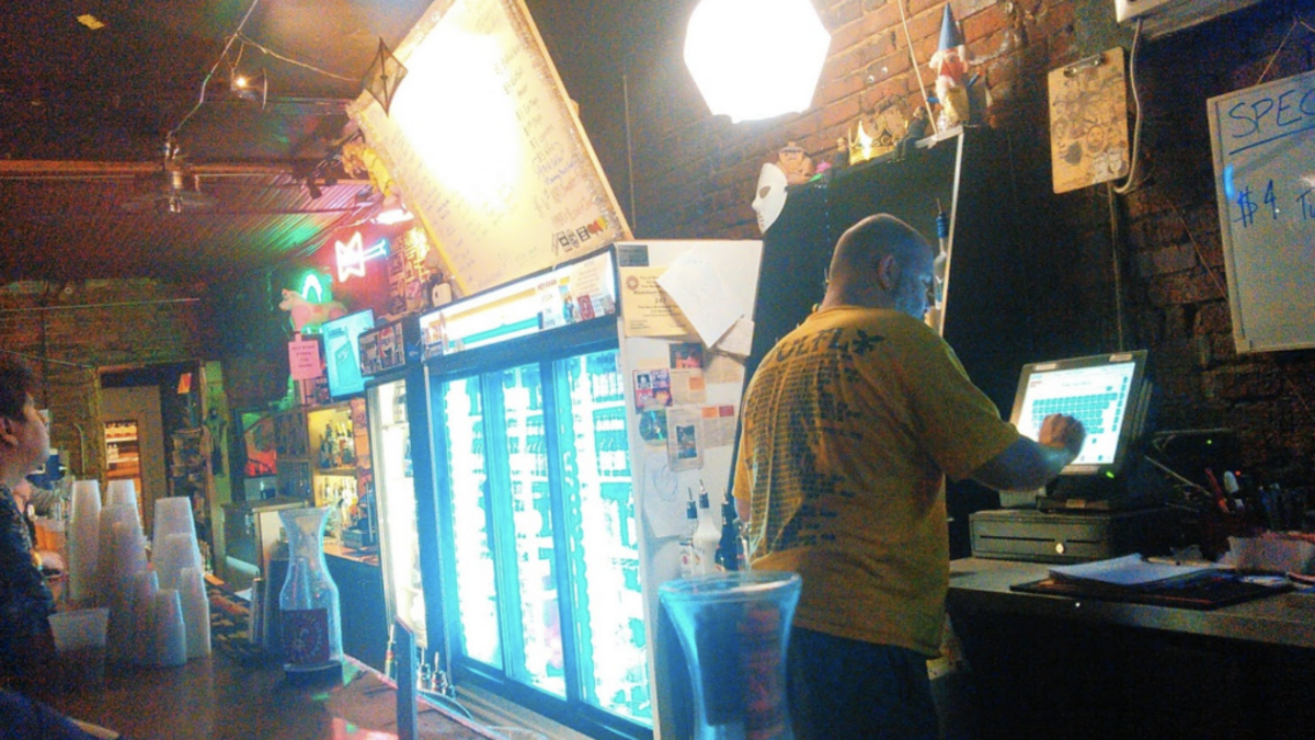 Behind the bar at New Brookland Tavern.