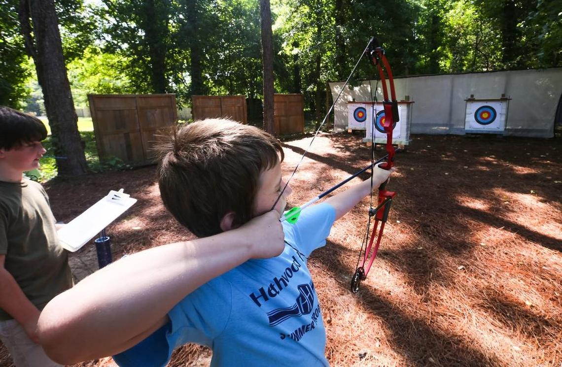 Campers learn archery skills during a past outdoor skills camp at Heathwood Hall.