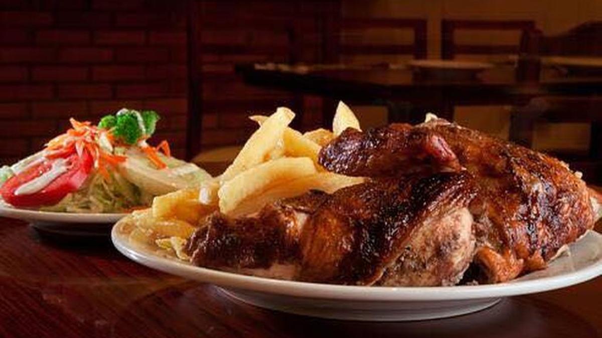 Lomo saltado, a dish with thin strips of beef sauteed with fresh onions and tomatoes, served with french fries.