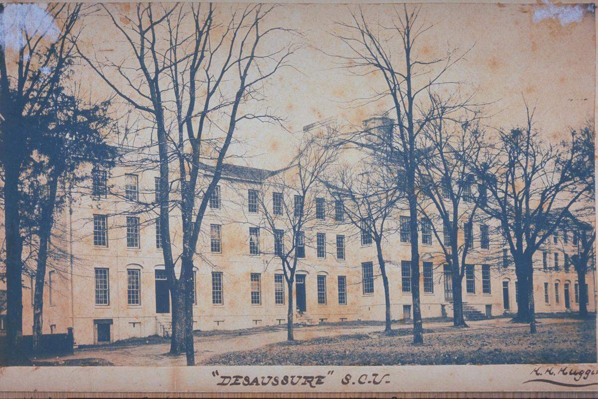 The University of South Carolina's DeSaussure College, shown around 1910, is said to be haunted by a woman with long, dark hair.