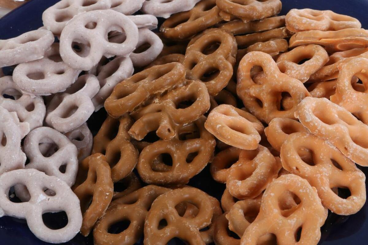 The Fresh Market’s pumpkin spice yogurt pretzels, right, with salted caramel pretzels, center, and apple cider yogurt pretzels.