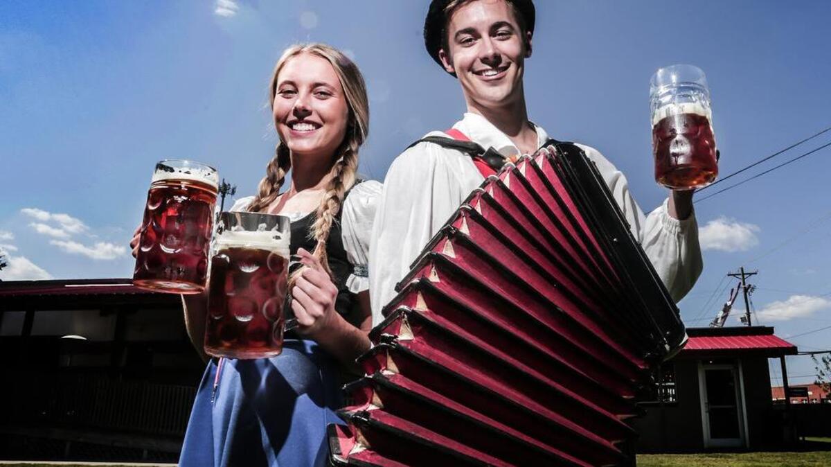 Taylor Kitchen and Robert Griffiths prepare to celebrate Oktoberfest at River Rat Brewery.