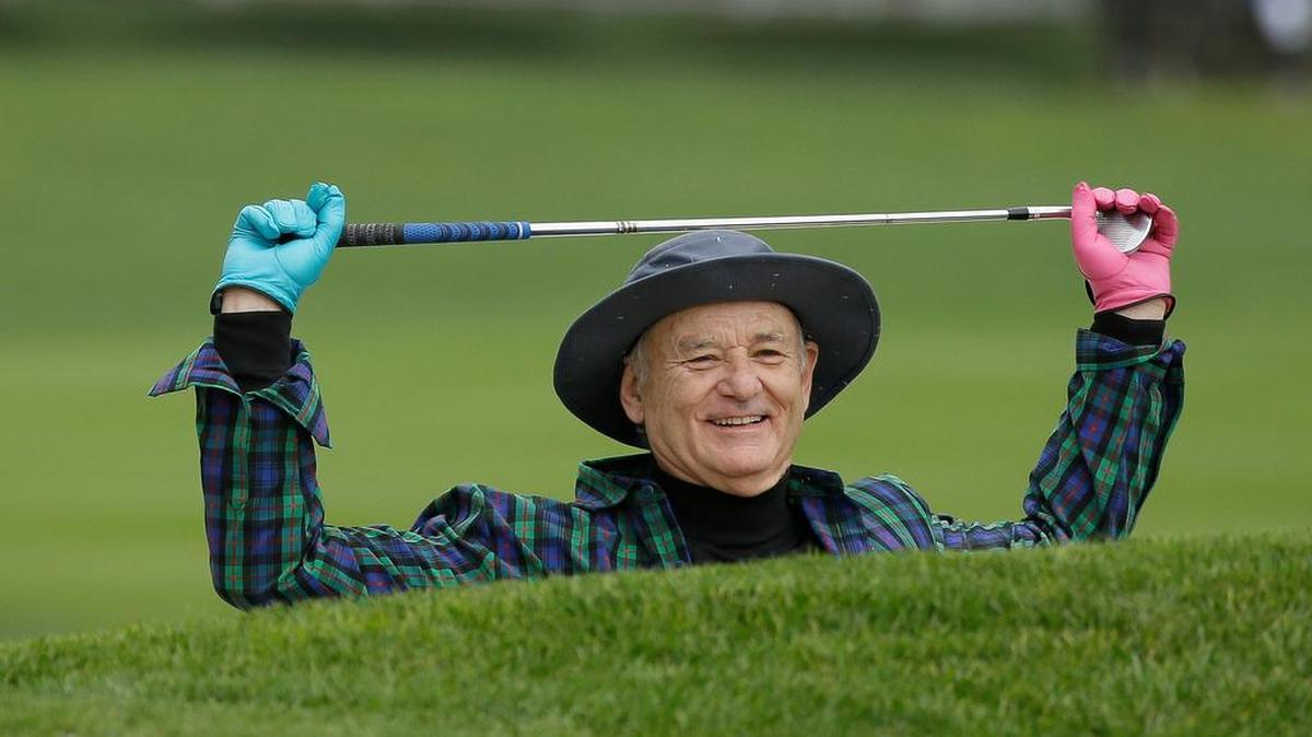 Bill Murray prepares to hit out of a bunker onto the third green during the celebrity challenge event of the AT&T Pebble Beach National Pro-Am golf tournament Wednesday, Feb. 8, 2017, in Pebble Beach, Calif.