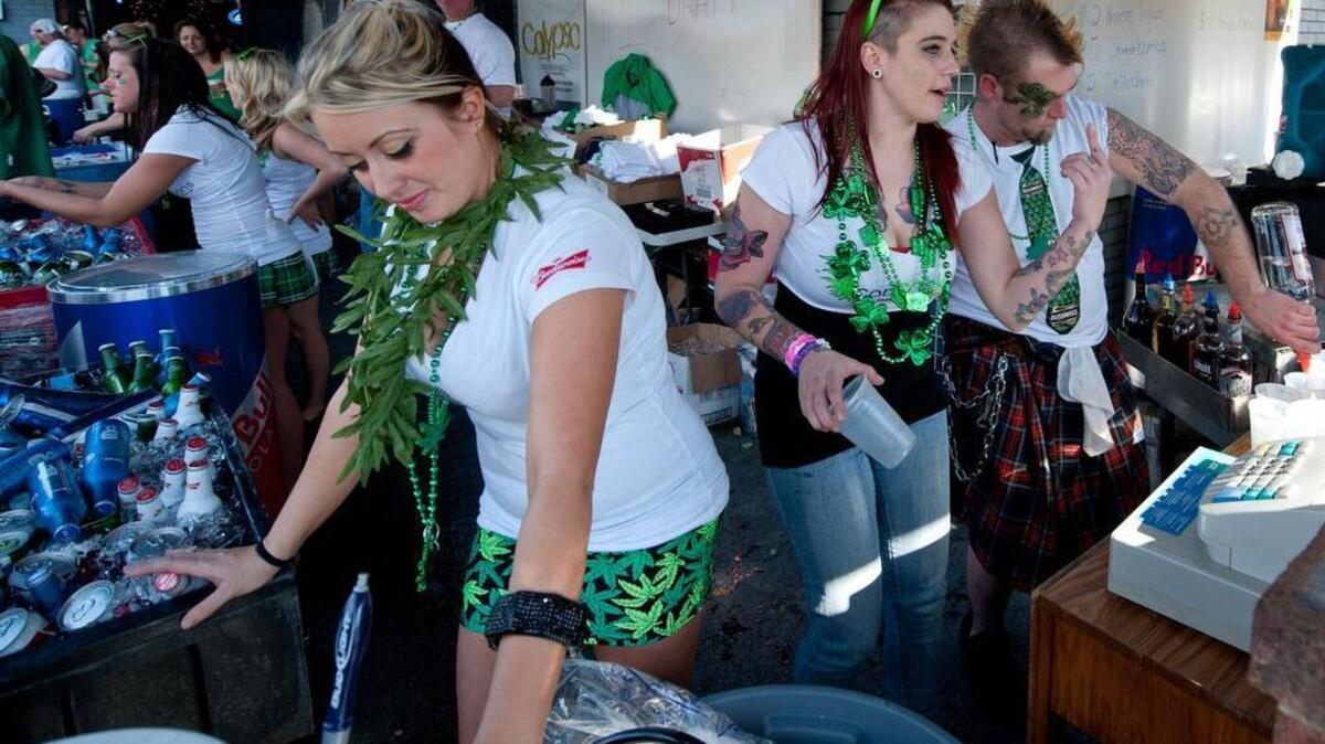 The Concocktions crew serves up drinks along Harden Street during a previous St. Pat’s celebration.