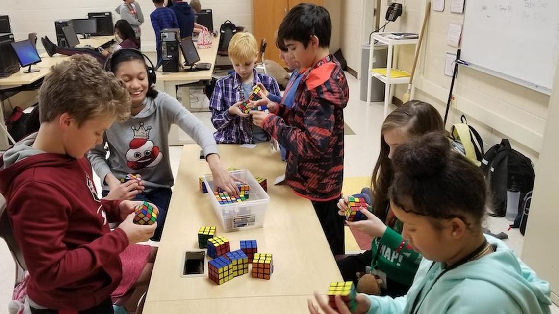 Richland One students work to solve the Rubik’s Cube.