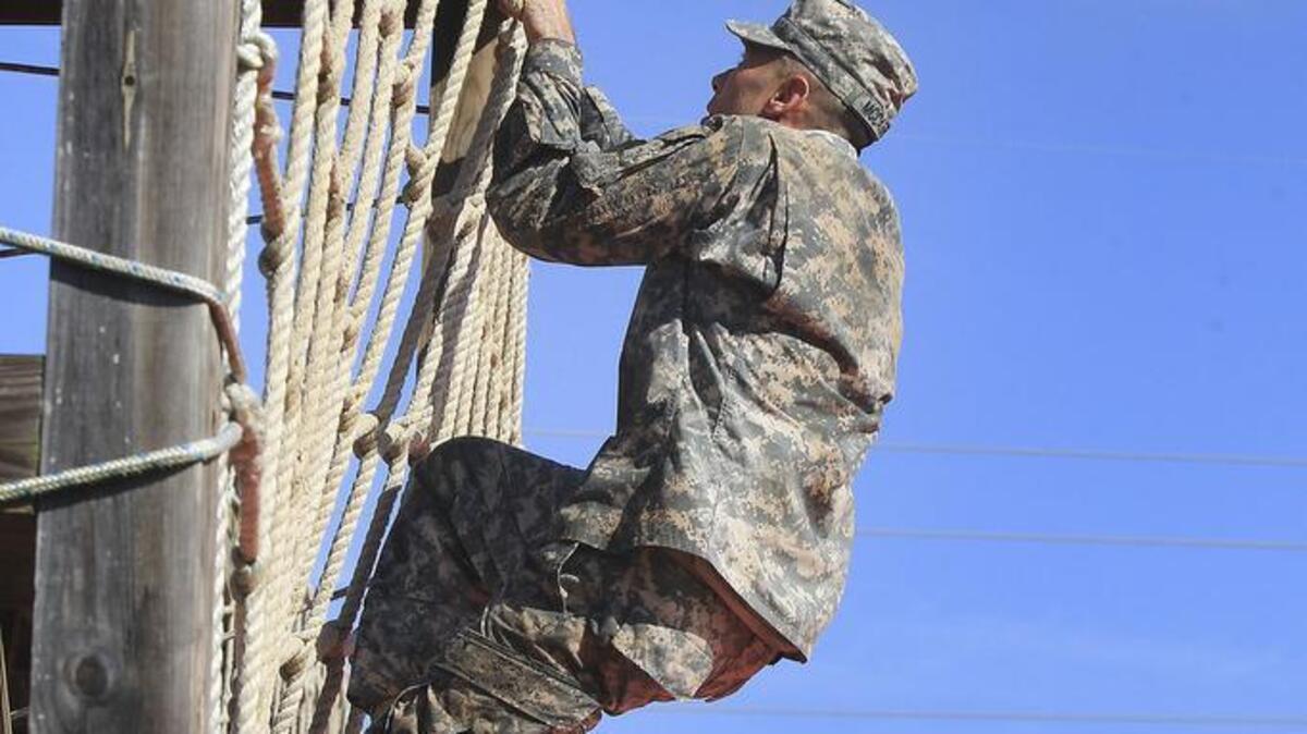 
SFC Ryan McCaffery of the 98th races the clock on the obstacle course. A National Drill Sergeant competition was held at Fort Jackson this week.
