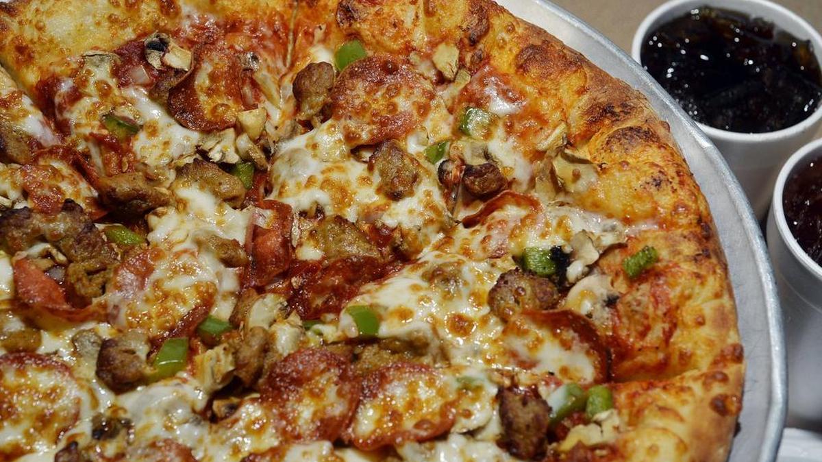 Stoner’s Pizza Joint is opening in the Arcade Mall on Columbia’s Main Street. This is Stoner's large deluxe pizza with hand thrown crust.