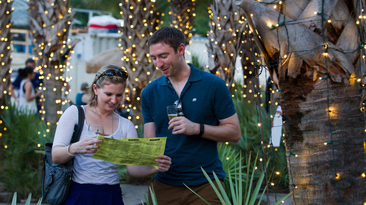 Sandra Coulon and Brad Hartley enjoy attend a past Brew at the Zoo. The event, scheduled this year for Friday, Aug. 3, usually sells out well in advance.