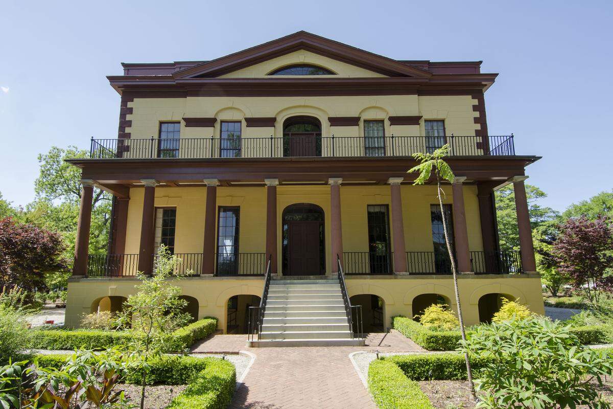The most obvious update to the Hampton-Preston Mansion is its exterior paint color. The home’s new ochre yellow paint with brown trim is a palette more fitting with its antebellum origins than its previous gray and white color scheme.