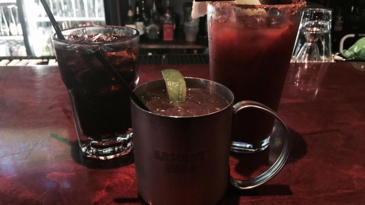 
Bulldog cocktails, clockwise from top left, are rum butter, Bulldog bloody Mary and the Jameson Black Barrel mule.
