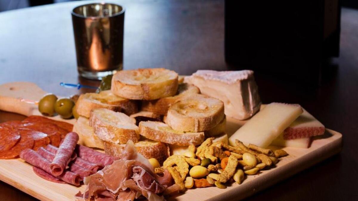“The charcuterie board (at the Aristocrat) has manchego, brie and smoked gouda with prosciutto, salami and pepperoni,” owner Ashley Garcia said. “It is served with toasted garlic baguette and pepper jelly. This is something a lot of people order to share.”