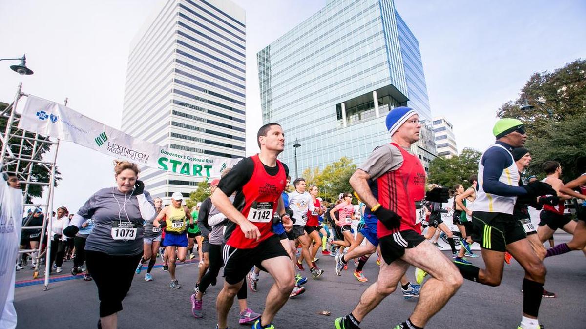 Runners leave the starting gate during an event in the 2014 Governor’s Cup in downtown Columbia.