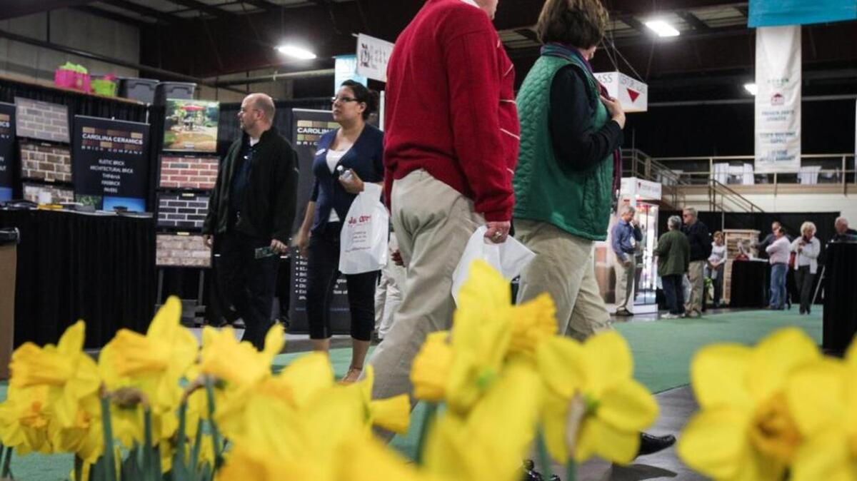 Visitors walk the aisles of a past Carolina Classic Home & Garden Show.