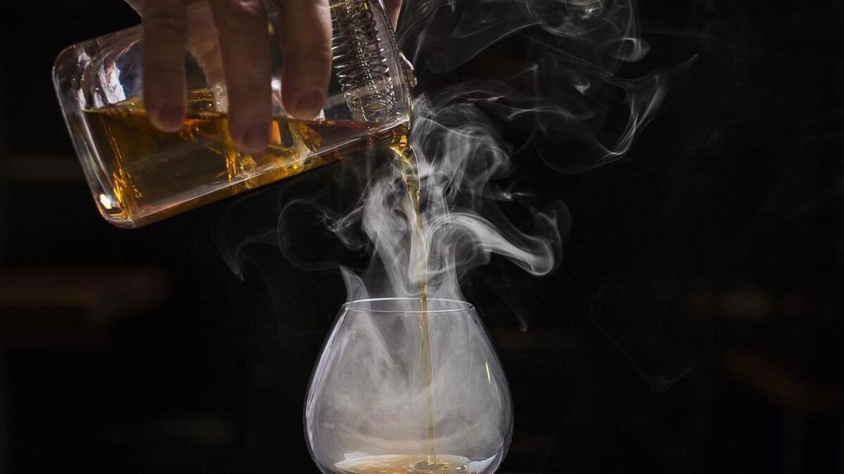 Light up the romance while drinking the Heart of Darkness, one of Bourbon’s signature craft cocktails.
