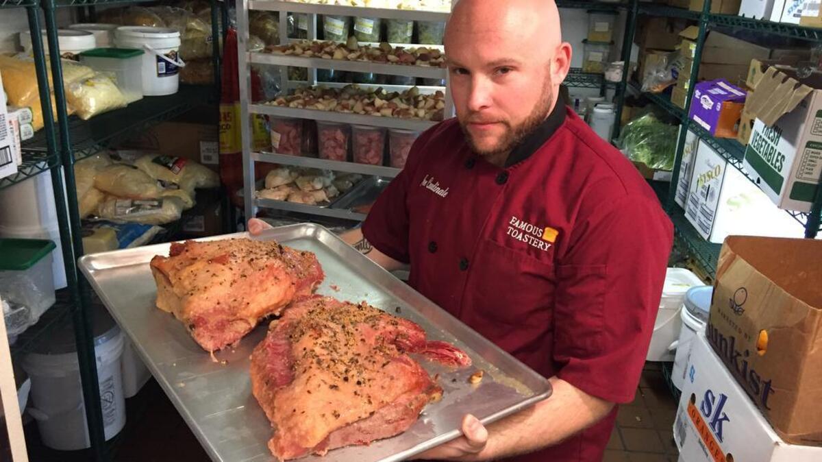 Chef Joe Cardinale prepares briskets to use in Famous Toastery’s corned beef hash, one of the Northeast Richland restaurant’s most popular dishes.