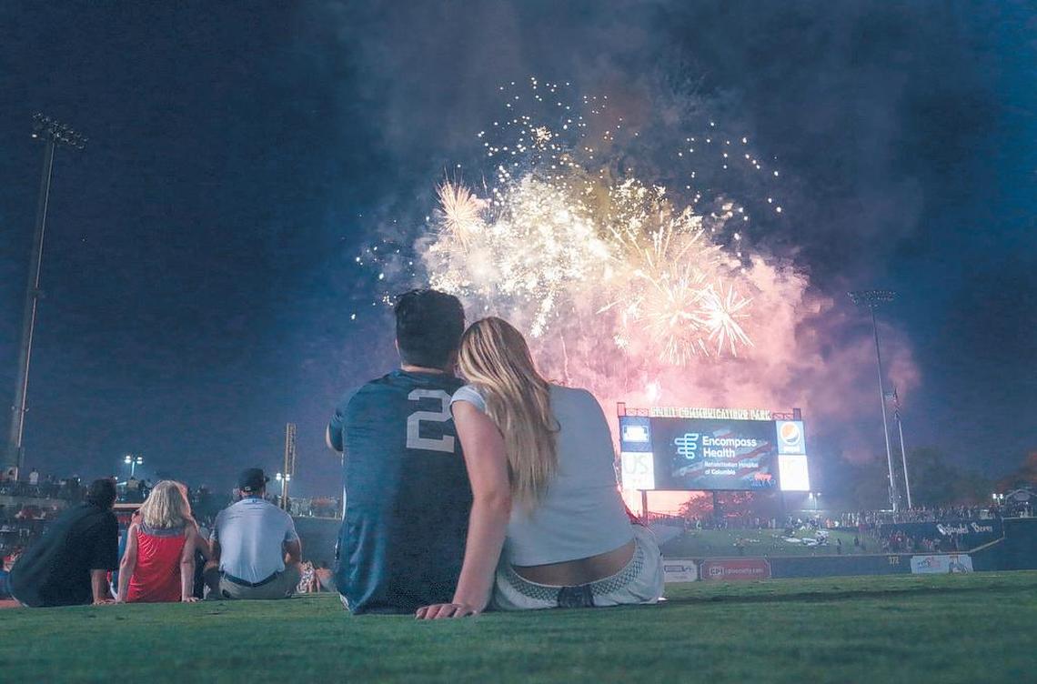 Firefly centerfielder Quinn Brodey and Charlotte Ward watch fireworks from Spirit Communications Park in celebration of Independence Day. 7/4/18