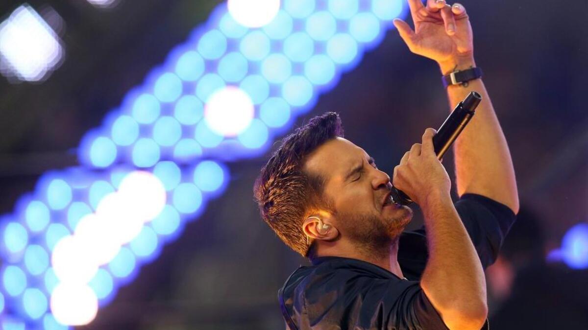 Luke Bryan, shown here performing at half time during a 2015 Panthers-Cowboys NFL game, is coming to Columbia for a concert this week.