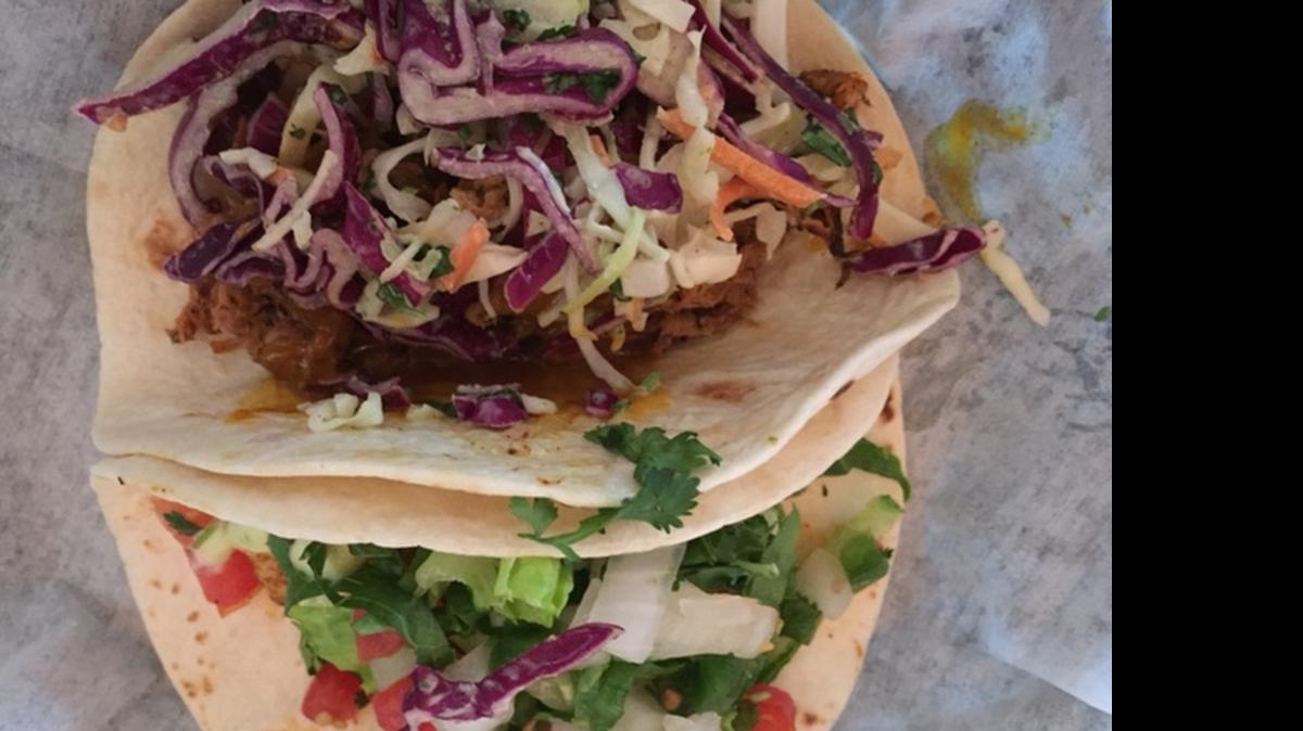
The smoked pork and chicken pesto tacos at Cantina 76.
