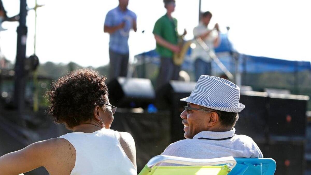 Enjoying live music at a past Rooftops Rhythms event in Forest Acres.