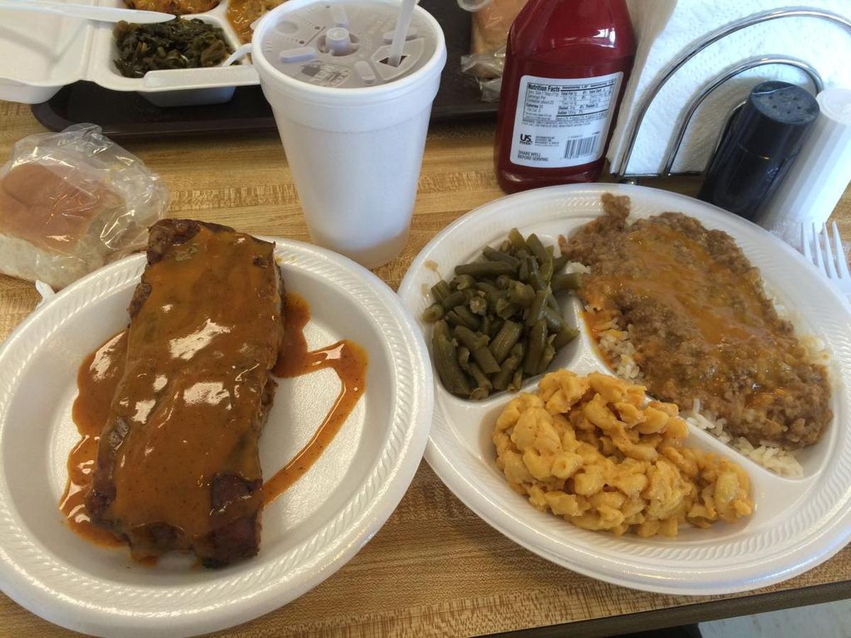 The rib dinner at Big T’s on Garner’s Ferry includes hash and rice and two sides – green beans and mac and cheese.
