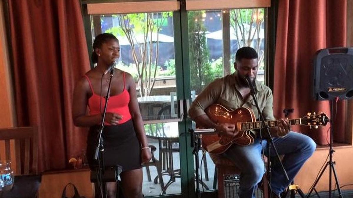 Musicians perform on a recent evening at Gervais & Vine in the Vista.