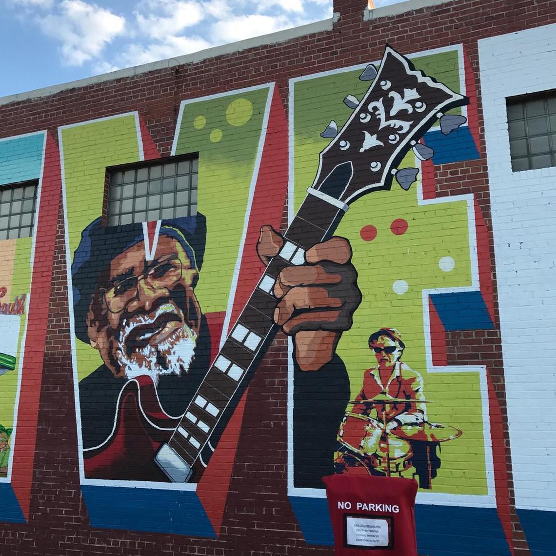 Jazz artist Drink Small is featured prominently on a mural in Five Points