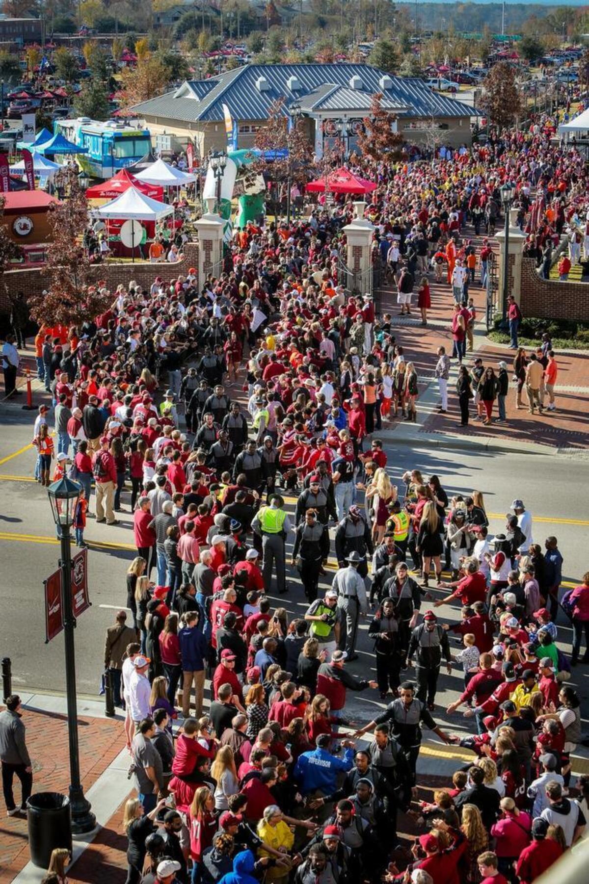 Two hours and 15 minutes before home games, the football team, marching band and cheerleaders march down Garnet Way on the way to the stadium.