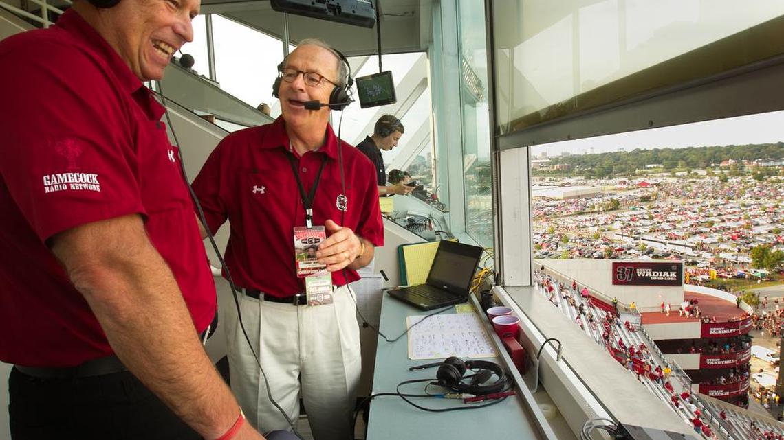 Todd Ellis, left, broadcasts a South Carolina football game.