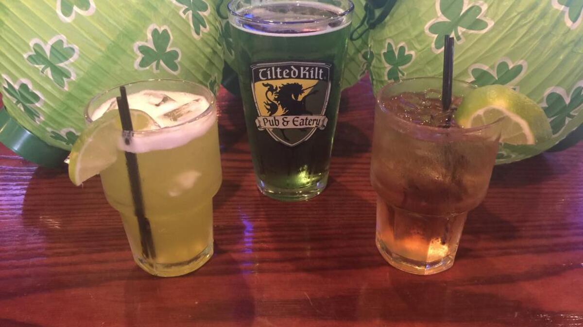 Specials at Tilted Kilt, serving up pub favorites, include from left, the Lucky Kiss, Green Miller Light beer and a Jameson and Ginger mixed drink