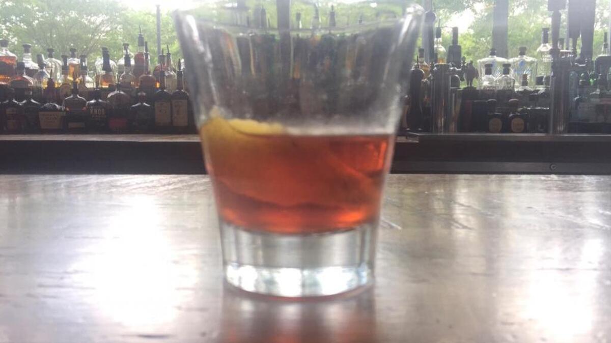 The Oak Table’s El Primero contains bitters, a fusion of rooibos tea and Mezcal tequila in an absinthe-lined glass, garnished with a lemon twist. “It’s a grown-up drink,” says bartender Jordan Moore.