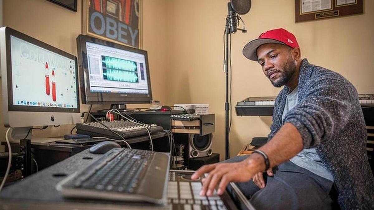 Clemson University doctoral candidate A.D. Carson works on his music in his home studio near campus, Jan. 30, 2017. Carson used the studio to produce “Owning My Masters: The Rhetorics of Rhymes and Revolutions”, a 34-track rap album that also serves as his dissertation. (Photo by Ken Scar)