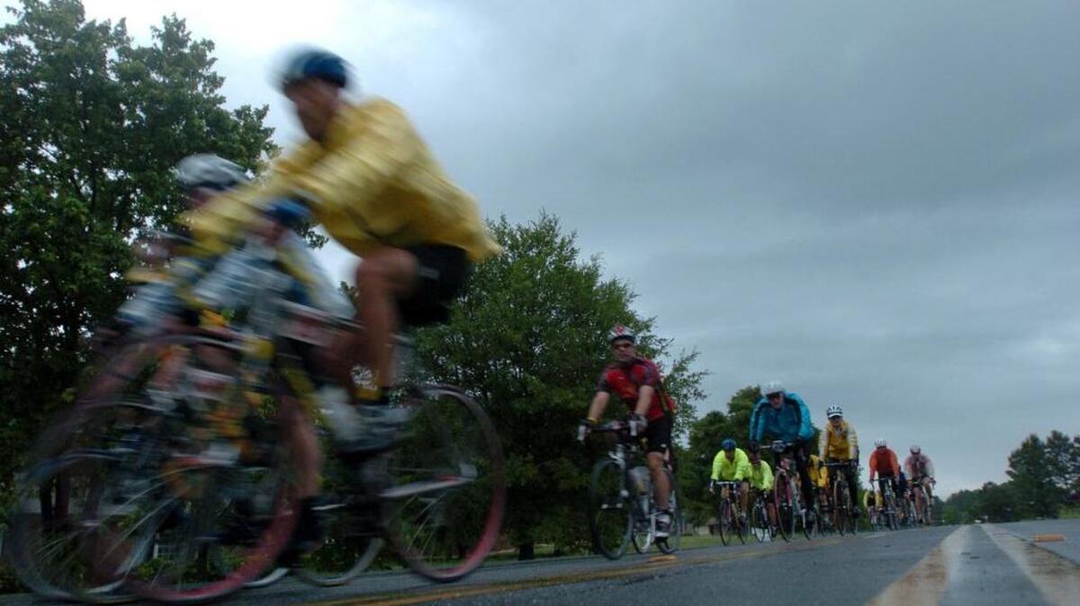 FRIDAY 05/20/05 -- SPARTANBURG, S.C. -- The State newspaper columnist and hundreds of other riders embarked on the New Assault on Mt. Mithcell ride starting in Spartanburg. Some of the riders will finish on Mt. Mitchell and some opted for the shorter route, as Monk did, finishing on Mt. Marion 74 miles from the start line. Riders peddle north on Paris Bridge Road, a slightly changed route from other years. PHOTOGRAPH BY RICH GLICKSTEIN / THE STATE
