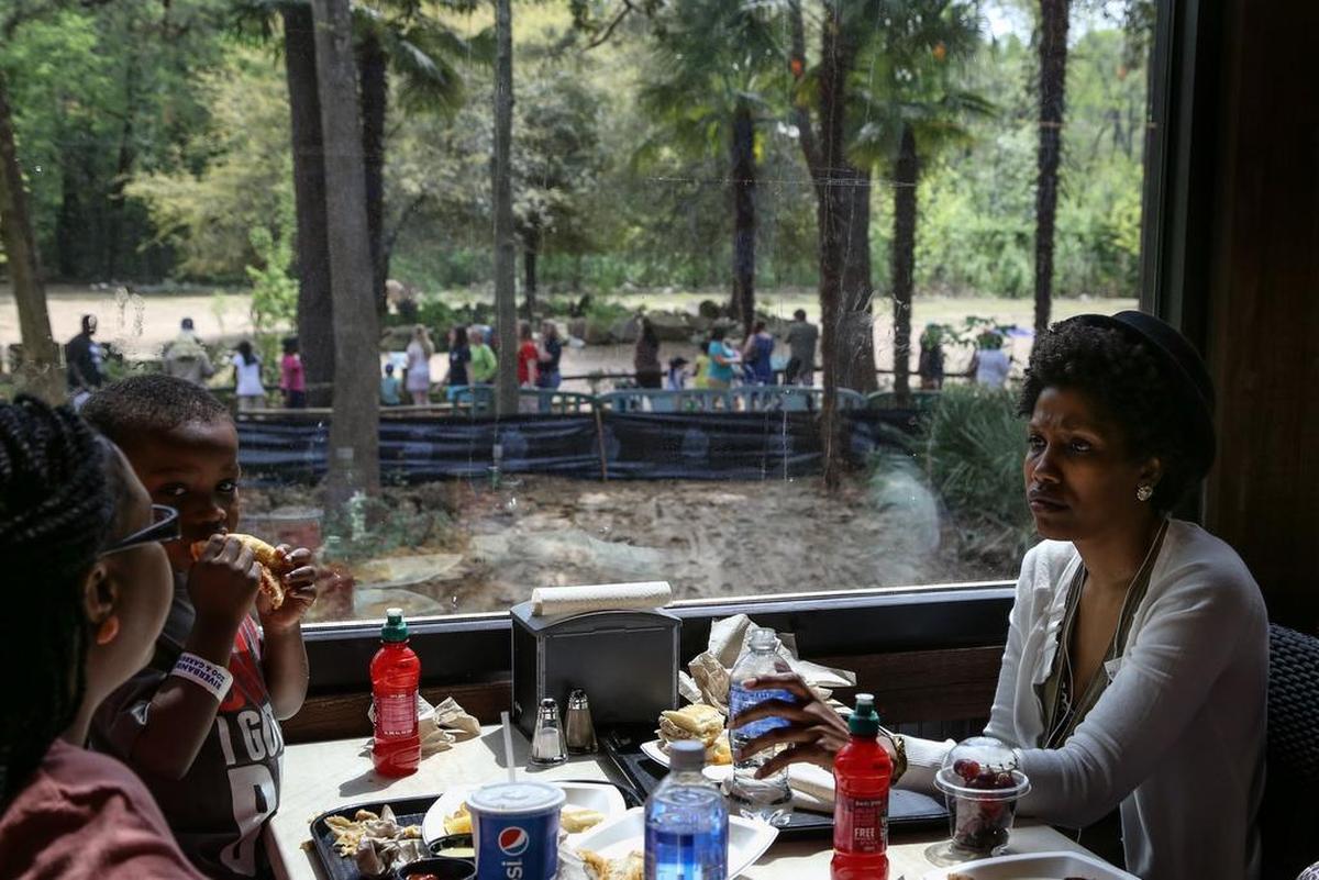 A group dine at Tuskers at Riverbanks Zoo.