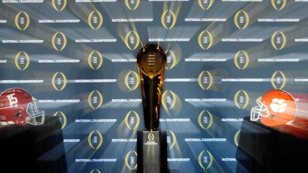 The national championship trophy is seen before a Sunday news conference for the NCAA college football playoff championship game between Clemson and Alabama.