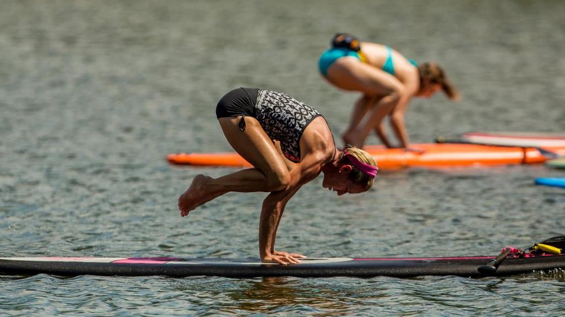 Chapin Yoga Center’s SUP Yoga Sundays class combines yoga with stand-up paddleboarding on Lake Murray.