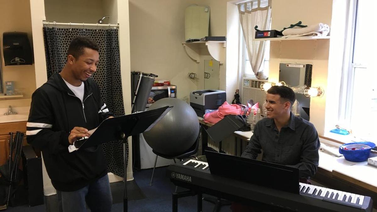 Zelig Williams, left, rehearses with fellow ‘Hamilton’ cast member David Guzman. Williams will appear in the Broadway show starting in October.