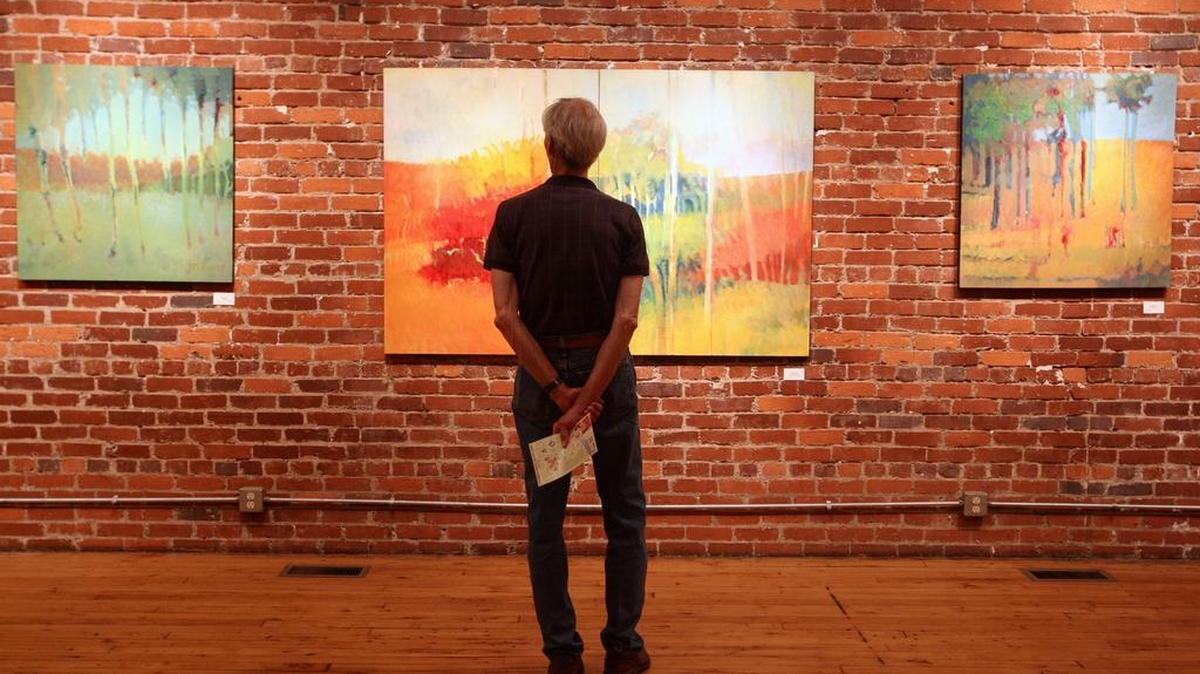 Viewing art at a past Artista Vista.