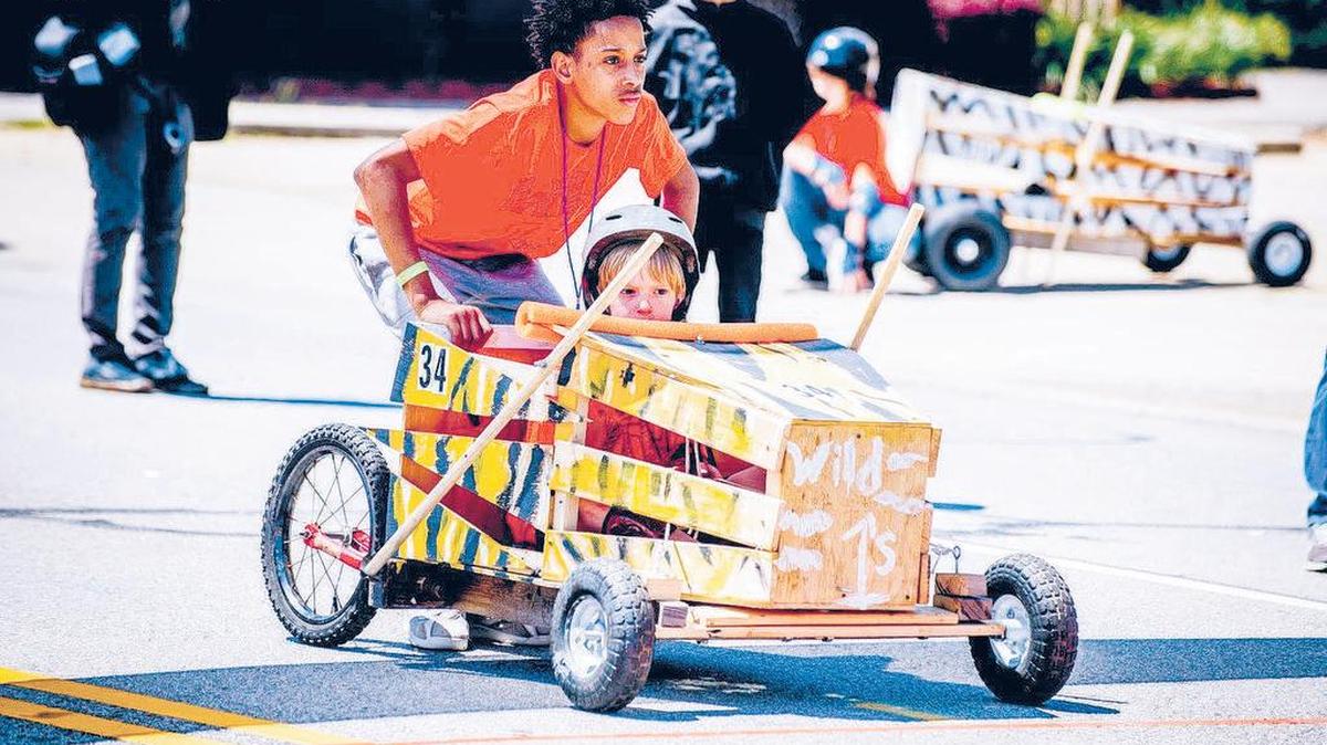The soapbox derby course gives the young and the young-at-heart the chance to build something fun and test it against gravity while racing down Meeting Street toward the river.