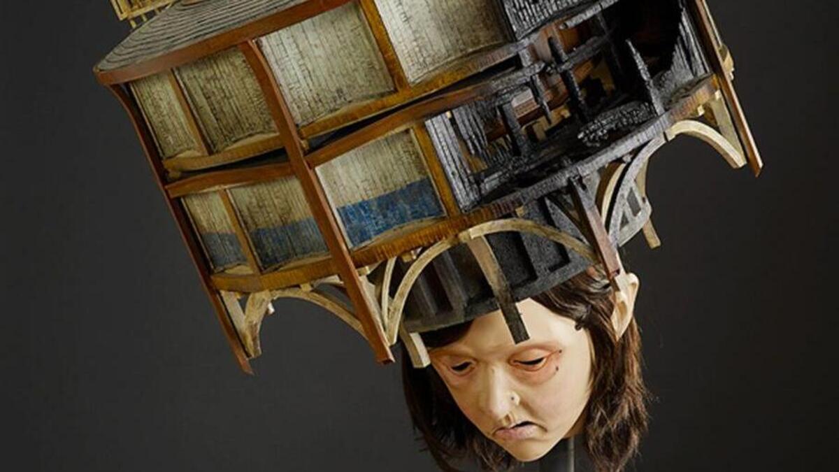 “Promontory,” 2013, by Dustin Farnsworth; basswood, poplar, plywood, veneer, bendable plywood, steel luan, human hair, various polychrome; 42 inches by 42 inches by 44 inches.