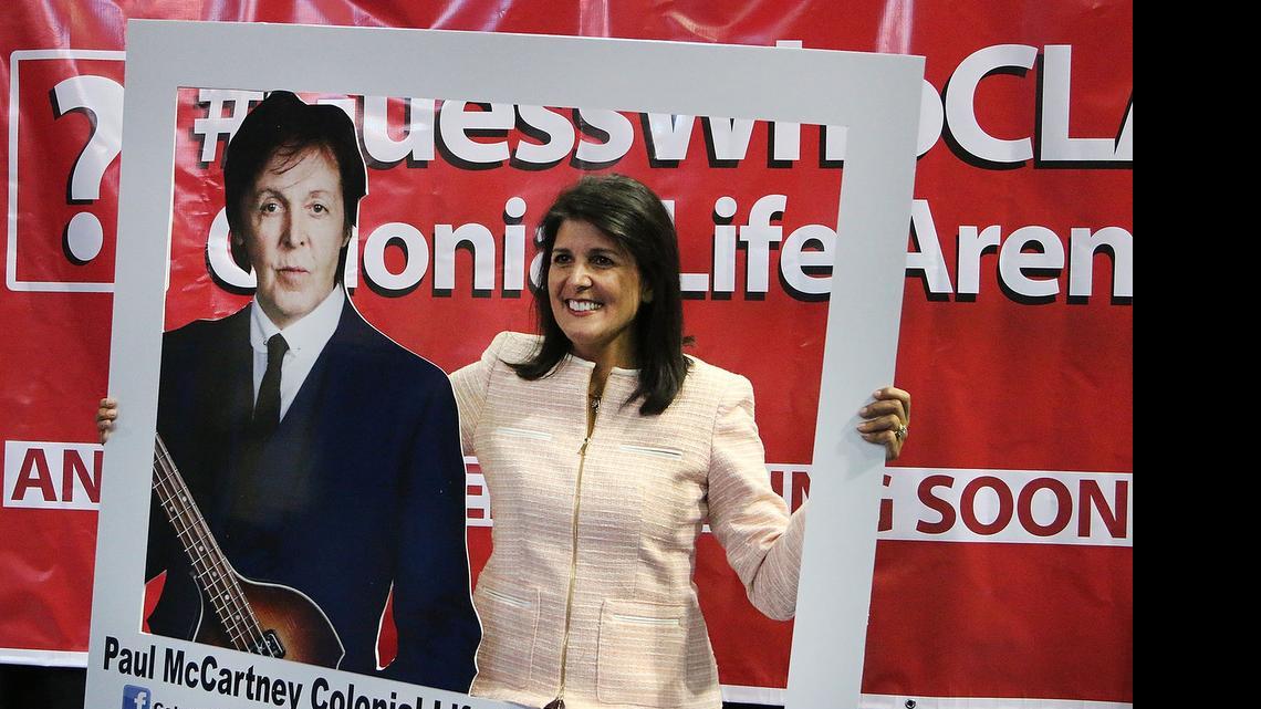 
Haley gets her photograph taken with a cut out of Paul McCartney. Gov. Nikki Haley, Ray Tanner and representatives from Colonial Life Arena and AEG Live announced, Tuesday, that Paul McCartney will be performing at Colonial Life Arena on June 25.
