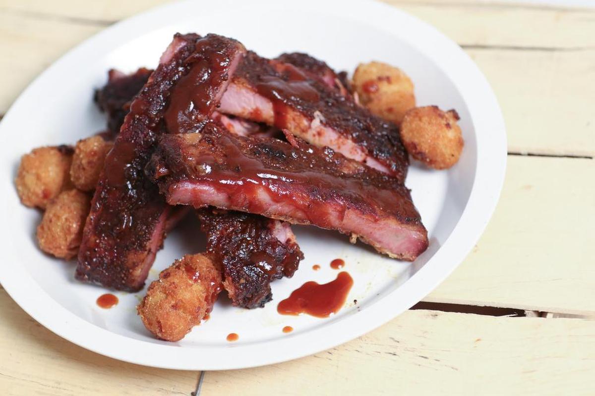 Ribs and hushpuppies from Midwood Smokehouse BBQ & Bar.